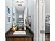 Stylish half bathroom with modern fixtures and decor at 6401 Morehead Rd, Harrisburg, NC 28075
