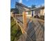 Spacious wooden deck with railing, offering a perfect spot for outdoor entertaining or relaxing in a serene setting at 690 Lake Head Rd # 132, Norwood, NC 28128