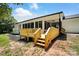 New wooden deck offering an inviting space for outdoor entertainment and relaxation at 7109 Forney Hill Rd, Denver, NC 28037
