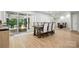 Bright dining room with large sliding glass door and wood-look flooring at 7109 Forney Hill Rd, Denver, NC 28037
