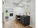 Dressing area features a makeup table, vanity, and views of the main bedroom fireplace at 7109 Forney Hill Rd, Denver, NC 28037