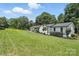 Attractive home with expansive lawn, enhanced landscaping, and a peaceful setting at 7109 Forney Hill Rd, Denver, NC 28037