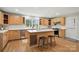 Spacious kitchen featuring a large island and natural wood cabinetry at 7109 Forney Hill Rd, Denver, NC 28037