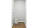 Laundry room featuring vinyl floors, hookups, and a stylish rolling laundry basket at 7109 Forney Hill Rd, Denver, NC 28037