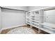 Spacious walk-in closet featuring custom shelving for organized storage at 7109 Forney Hill Rd, Denver, NC 28037