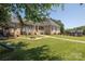 Spacious backyard with patio, fire pit, playset and well-maintained lawn at 735 Pebble Pt, Salisbury, NC 28146