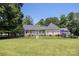 Spacious backyard with a black fence surrounding the property, perfect for outdoor activities and privacy at 735 Pebble Pt, Salisbury, NC 28146