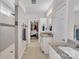 Detailed bathroom showing walk-in shower, granite vanity and walk-in closet at 735 Pebble Pt, Salisbury, NC 28146
