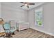 Cozy Bedroom or bedroom with wood floors and a crib, perfect for a Gathering at 735 Pebble Pt, Salisbury, NC 28146