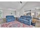 Spacious open-concept living room with lake views and hardwood floors at 735 Pebble Pt, Salisbury, NC 28146