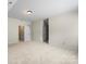 Large carpeted bonus room area with good natural light and ample room for activities at 8712 Soaring Eagle Ln, Waxhaw, NC 28173