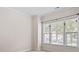 Bright, neutral bedroom with large windows and clean design at 8712 Soaring Eagle Ln, Waxhaw, NC 28173
