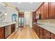 Bright kitchen with granite countertops, stainless steel appliances, and ample cabinet space at 8712 Soaring Eagle Ln, Waxhaw, NC 28173