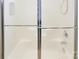 Close-up of glass shower doors with chrome hardware at 8712 Soaring Eagle Ln, Waxhaw, NC 28173