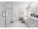 Spacious bathroom featuring a walk-in shower, built-in storage, and a soaking tub at 107 Creekwood Dr, Dallas, NC 28034