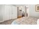 Bedroom view showcasing a closet, doorway, and a glimpse of the en-suite bathroom at 107 Creekwood Dr, Dallas, NC 28034