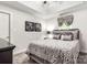 Bedroom with a tray ceiling, neutral decor, and a comfortable-looking queen size bed at 107 Creekwood Dr, Dallas, NC 28034