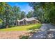 Beautiful brick home with landscaped front yard and long driveway at 107 Creekwood Dr, Dallas, NC 28034