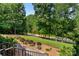 Beautiful landscaped front yard and neighborhood view from the home's entrance at 107 Creekwood Dr, Dallas, NC 28034