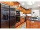 Beautiful kitchen with stainless steel appliances, granite countertops, and custom cabinetry at 107 Creekwood Dr, Dallas, NC 28034