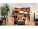 Open kitchen view showcasing custom cabinets, stainless steel appliances, and an island with bar seating at 107 Creekwood Dr, Dallas, NC 28034