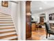 Open-concept living room with hardwood floors and stairs at 107 Creekwood Dr, Dallas, NC 28034