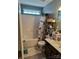 Cozy bathroom with a shower-tub combination and decorative shower curtain at 10825 Traders Ct, Davidson, NC 28036