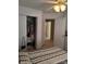Bedroom featuring a closet with ample storage space and nearby doorway at 10825 Traders Ct, Davidson, NC 28036