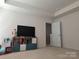 Bonus room featuring carpeted floors, neutral walls, and door to the hallway at 10825 Traders Ct, Davidson, NC 28036