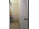 Small walk in closet with metal shelving and white walls at 10825 Traders Ct, Davidson, NC 28036