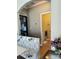 Hallway view showcasing access to the laundry room, and other rooms of the house at 10825 Traders Ct, Davidson, NC 28036