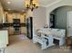 Bright eat-in kitchen featuring stainless steel appliances, granite countertops, and tile backsplash at 10825 Traders Ct, Davidson, NC 28036