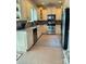 Well-equipped kitchen with stainless steel appliances, granite countertops, and stylish tile backsplash at 10825 Traders Ct, Davidson, NC 28036