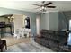 Spacious living room adjacent to the kitchen, featuring a sectional sofa and cozy bench seating at 10825 Traders Ct, Davidson, NC 28036