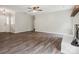 Living room area has grey walls, neutral flooring and a bright source of natural light at 1109 Manchester Ln, Charlotte, NC 28227