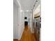 Convenient hallway laundry area with sliding barn door and modern washer and dryer at 132 General Pemberton St, Stanley, NC 28164