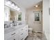 Elegant main bathroom with double vanity, marble countertops, and ample natural light at 132 General Pemberton St, Stanley, NC 28164