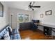 Functional office space with hardwood floors, a ceiling fan, and plenty of natural light at 132 General Pemberton St, Stanley, NC 28164