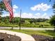 Scenic view overlooking a road, waterway, and lush greenery with a glimpse of a water tower at 132 General Pemberton St, Stanley, NC 28164