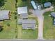 Aerial view of the property showcasing the home, outbuildings, and spacious surroundings at 151 Robinson Rd, Gastonia, NC 28056