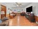 Cozy living room with wood paneling and a fireplace at 151 Robinson Rd, Gastonia, NC 28056