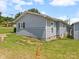 Rear view of the single-story home with a partial basement and exterior access at 151 Robinson Rd, Gastonia, NC 28056