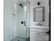 Contemporary shower room features frameless glass shower, sleek vanity, and modern fixtures for a spa-like experience at 1511 Waverly Ave, Charlotte, NC 28203