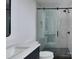 Contemporary bathroom featuring a glass-enclosed shower with a modern design and sleek fixtures at 1511 Waverly Ave, Charlotte, NC 28203