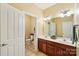 Bathroom features double vanity and a separate water closet for added privacy at 15620 Glen Miro Dr, Huntersville, NC 28078