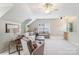 Comfortable living room with vaulted ceiling and plenty of natural light at 15620 Glen Miro Dr, Huntersville, NC 28078