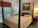 Bedroom features a four-poster bed and ample natural light at 1713 Arbor Way, Albemarle, NC 28001
