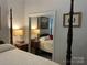 Bedroom with a four-poster bed and side tables at 1713 Arbor Way, Albemarle, NC 28001