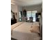 Bedroom with a dresser, comfy chair, and natural light at 1713 Arbor Way, Albemarle, NC 28001