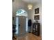 Elegant foyer with hardwood floors, decorative light fixture, and stylish furnishings at 1713 Arbor Way, Albemarle, NC 28001